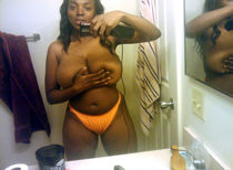 Hot ebony in golden bikini